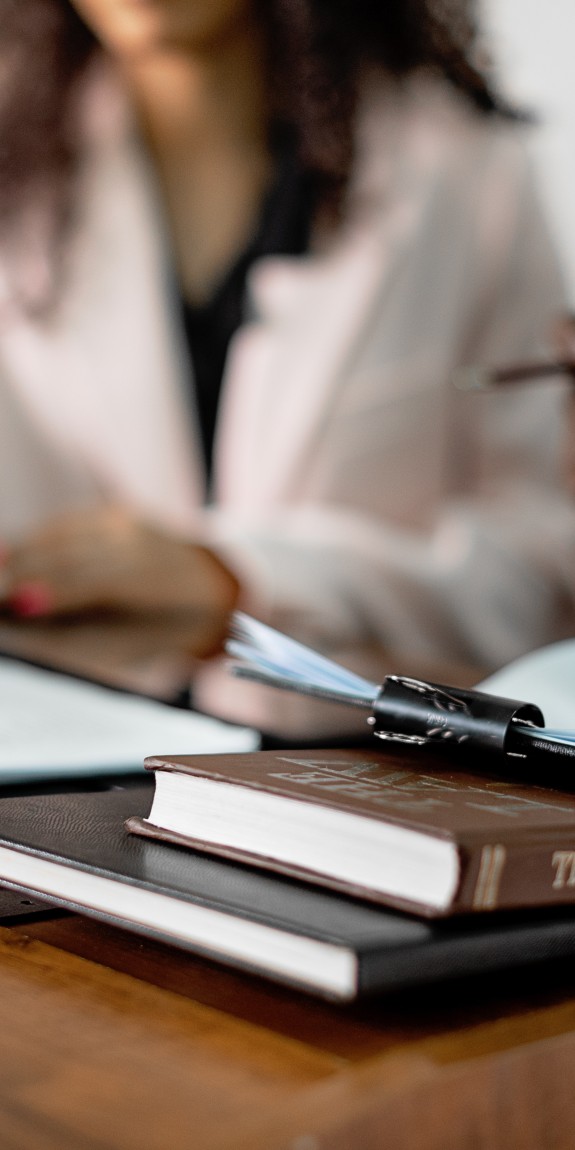 Lawyers hands with law books